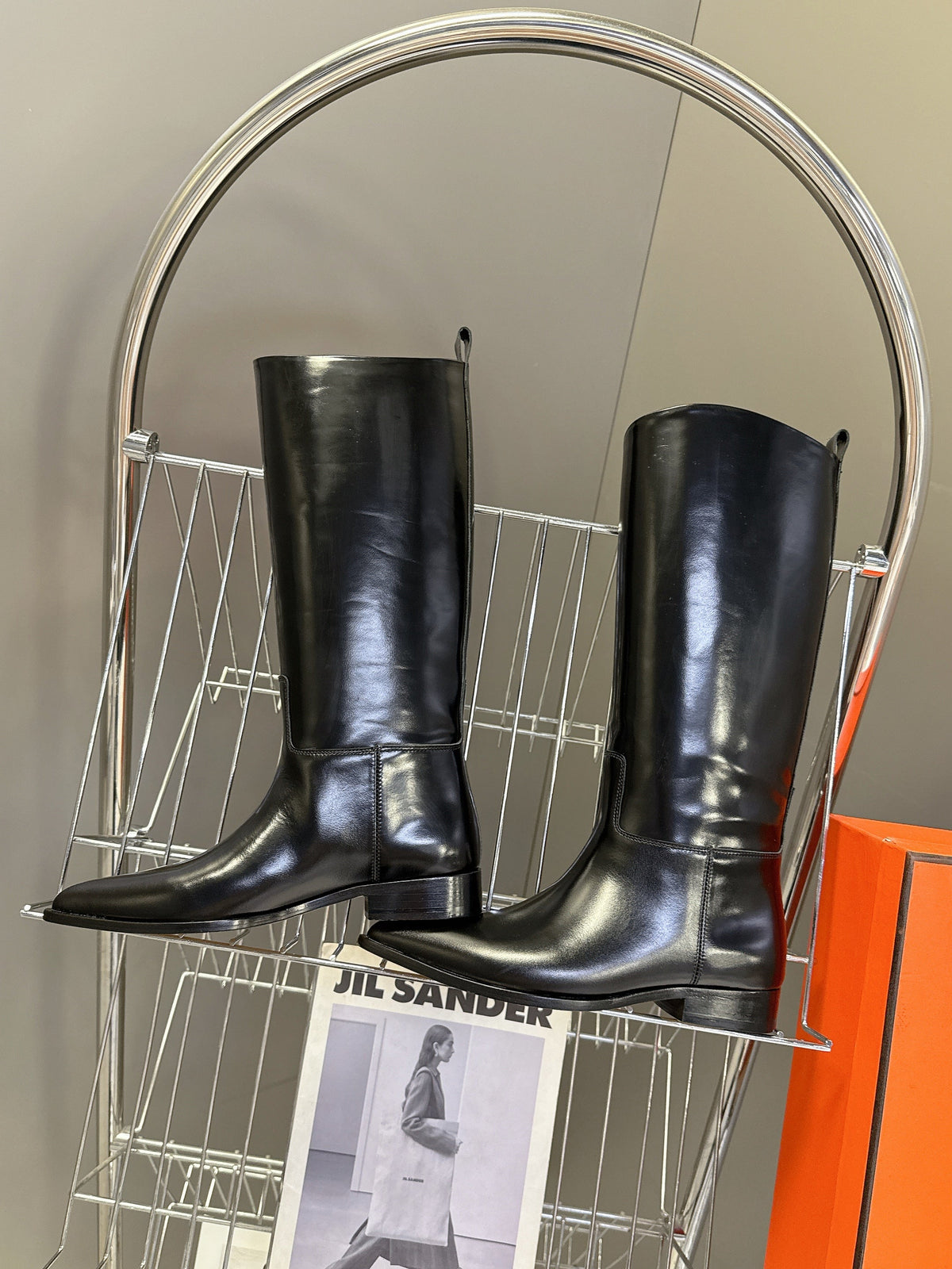 HERMES 25S POINTED-TOE KNEE-HIGH BOOTS IN BLACK GLOSSY LAMBSKIN